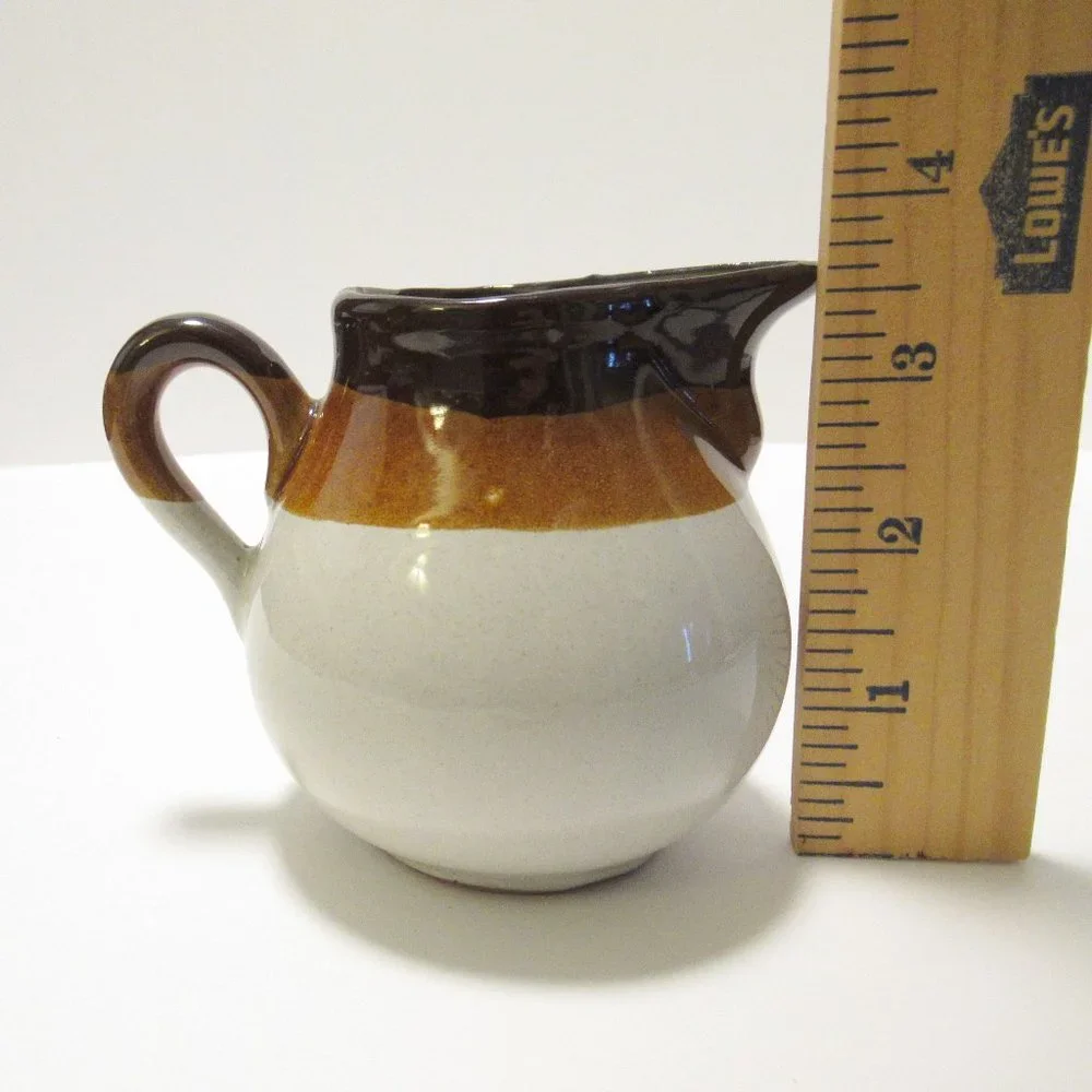 Brown and White Ceramic Serveware Pitcher